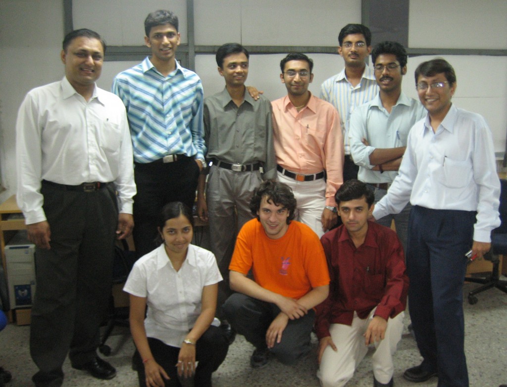 ITER IT specialist Carlo Capuano (below, middle), with members of the Indian IT team. Click picture for high-res.