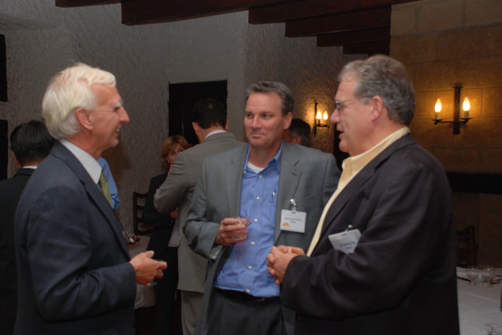 Frank Briscoe (left) talking to Panel members Mark Reich and Kem Robinson from the US during a dinner reception this week.  