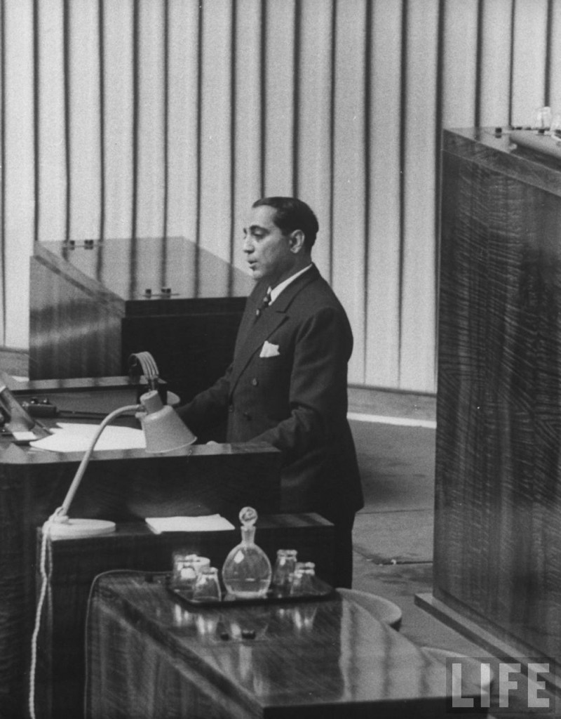 Homi Bhabha at the podium in the UN assembly in Geneva making the opening speech of the First UN Conference on the Peaceful Uses of Atomic Energy.