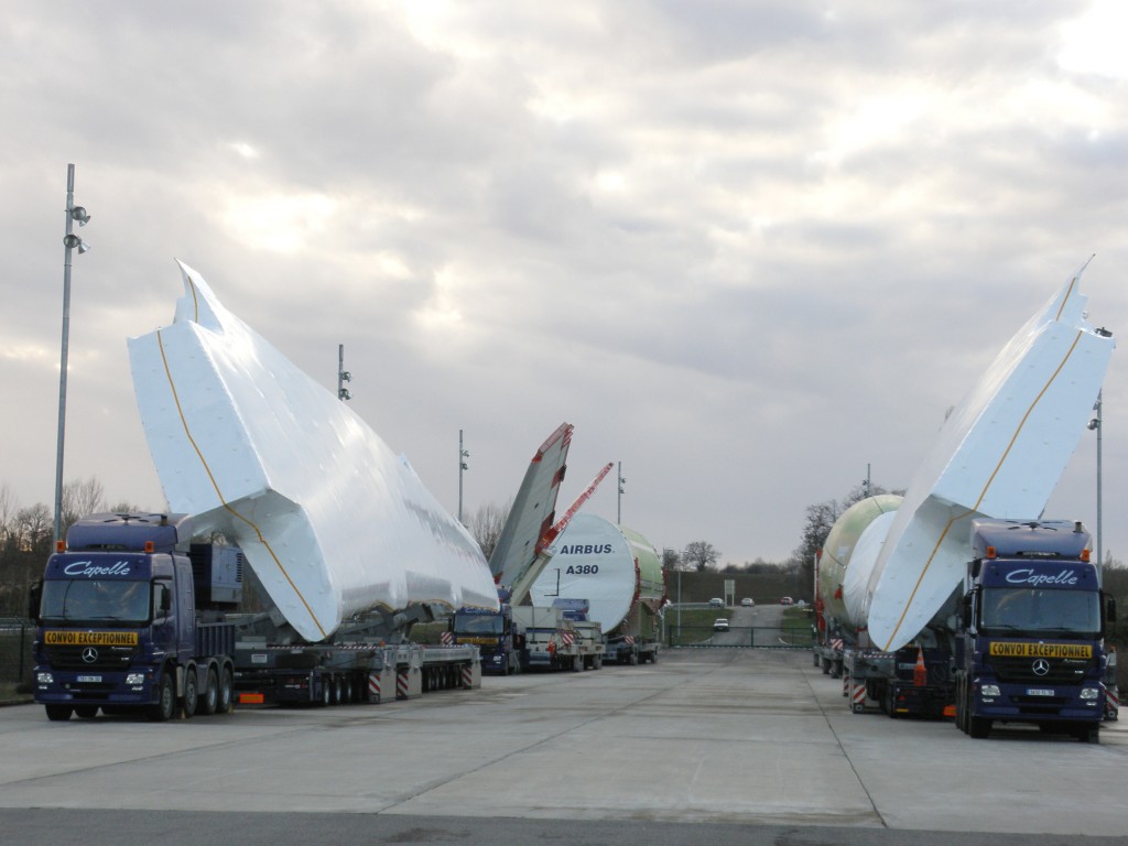 The two airplane wings, a tail wing and three parts of the A380 fuselage on their way to the Airbus assembly site in Toulouse. 
