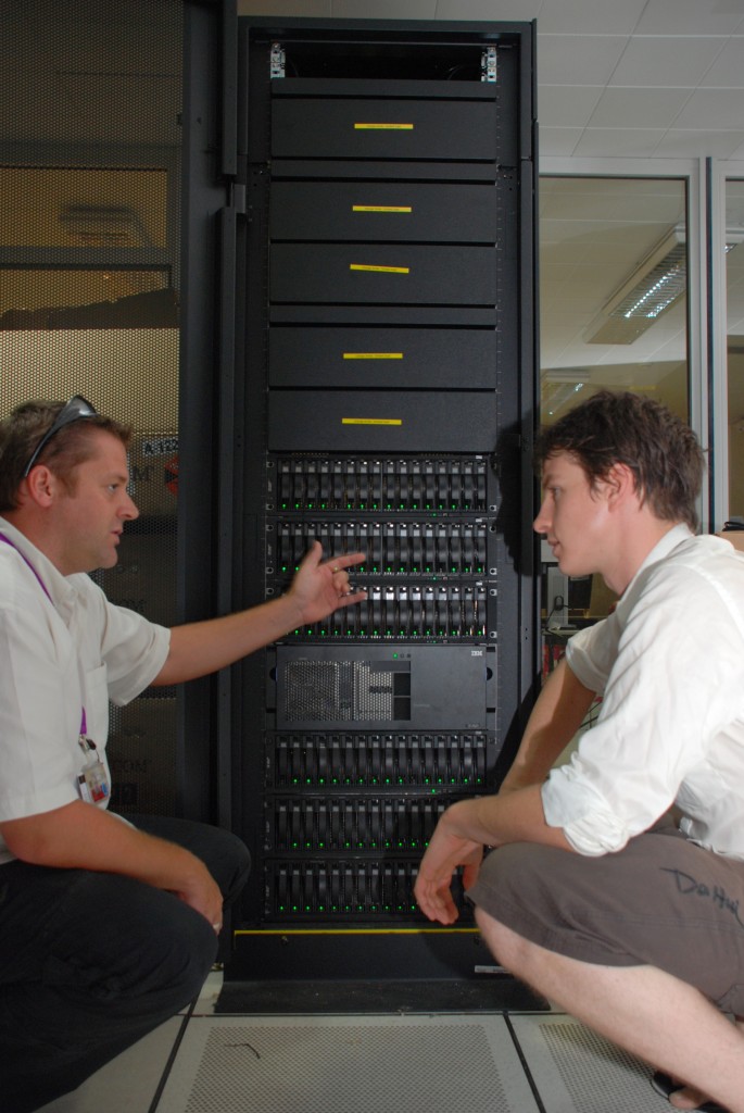 Cedric Chaumette (left) from the OSIATIS team and
webmaster Topher White in the server room
