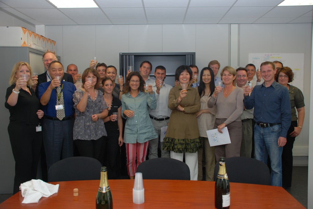 The ITER Finance & Procurement Divisions celebrate after completion.¶