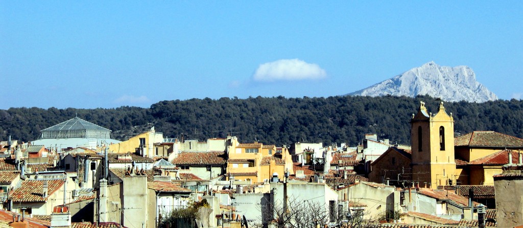 Mount Sainte-Victoire, which rises 1,011 metres from the plain, seems to tower above the town of Aix-en-Provence.