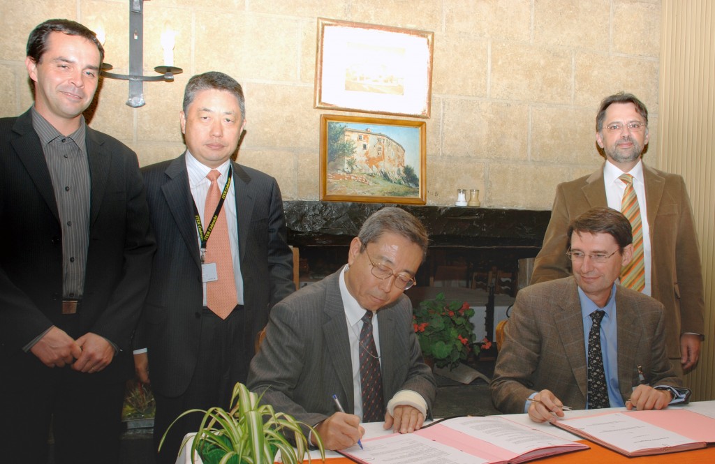 The signature at the bottom of a Procurement Arrangement is the climax to a long story. Here: the two Directors with the team that prepared the documents, Responsible Officer Joël Hourtoule, the Deputy Director-General in charge, Yong-Hwan Kim, and Division Head Ivone Benfatto.  (Click to view larger version...)