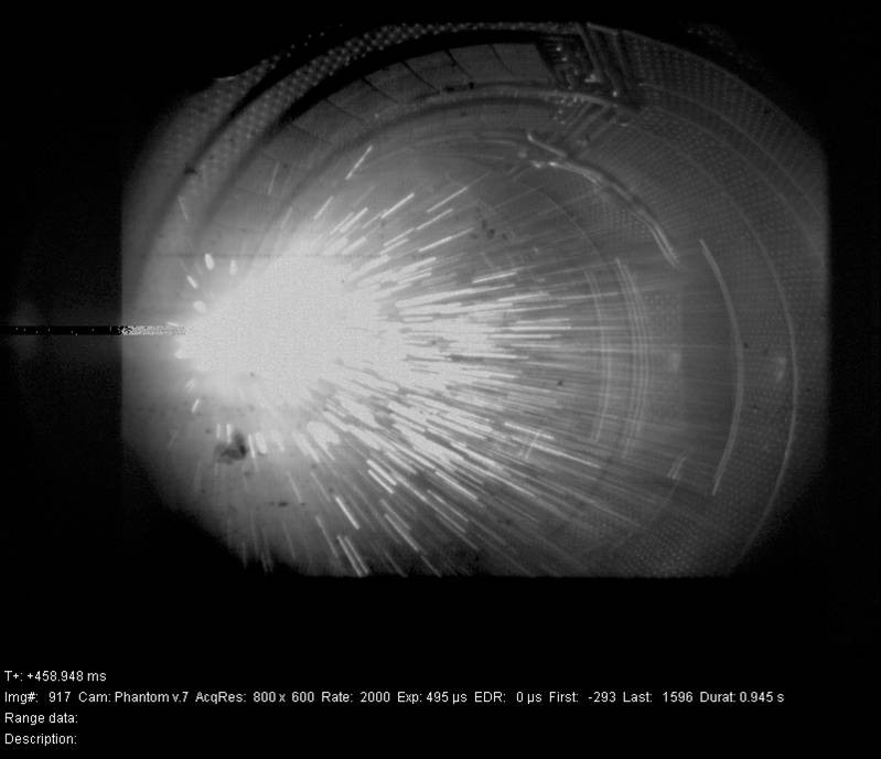 This photo was taken inside Tore-Supra during experiments on runaway electron control and termination carried out for ITER. It shows  carbon dust particles produced from a plasma-facing component under the impact of runaway electrons caused by a disruption. (Photo courtesy: CEA). (Click to view larger version...)