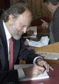 Jean Jacquinot signing the book.