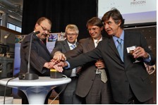 Norbert Holtkamp (second from left), Erkki Leppavuori, Didier Gambier, and Octavio Quintana Trias pressed the button that set the first full-size prototype for ITER into motion.