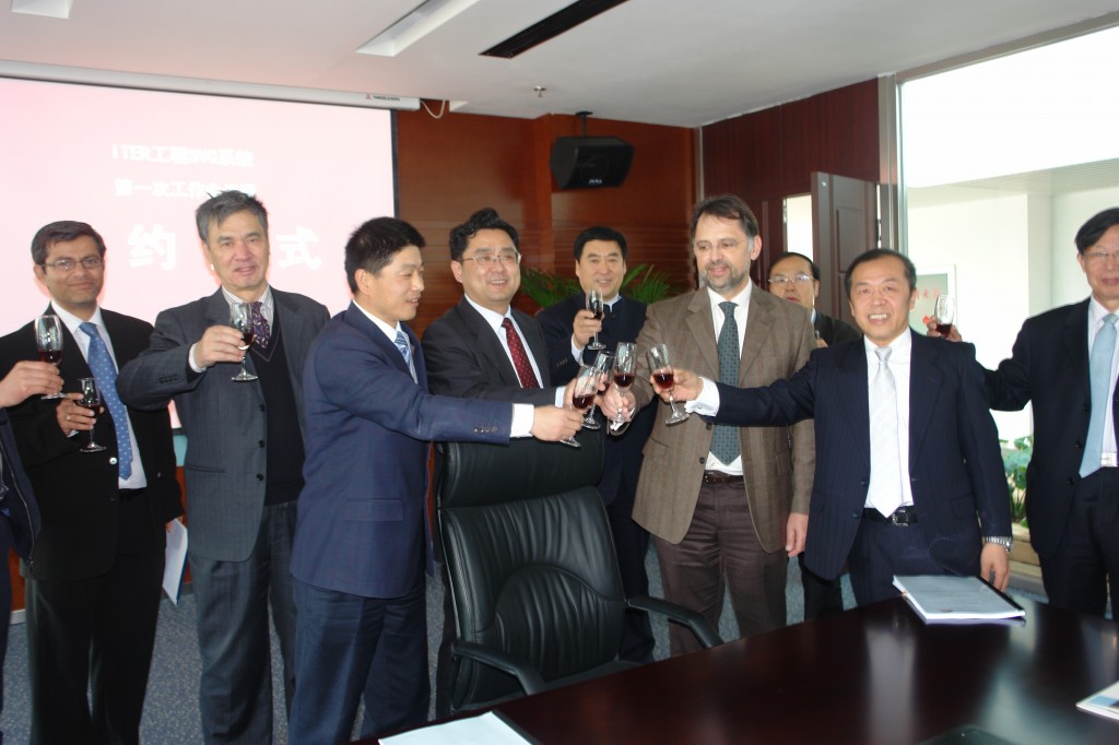 Q.Zuo (president of RXPE), D.Ye (Vice-Mayor of Anshan), and representatives of ITER Organization and the Chinese Domestic Agency celebrate the signature of the framework contract. (Click to view larger version...)